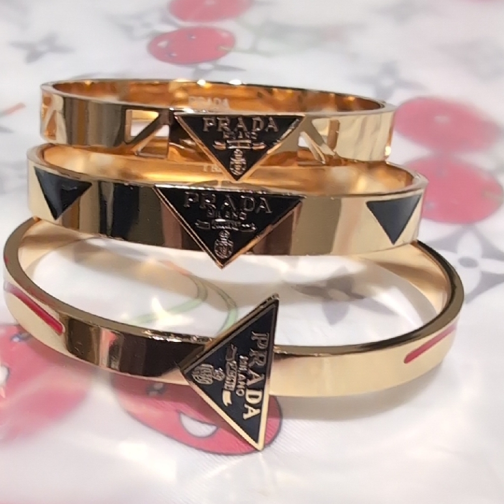 Source Unknown Gold and Black Women's Bracelets